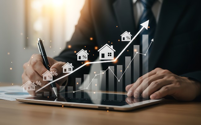 Como obter renda extra com imóveis. Foto mostra casas com gráfico