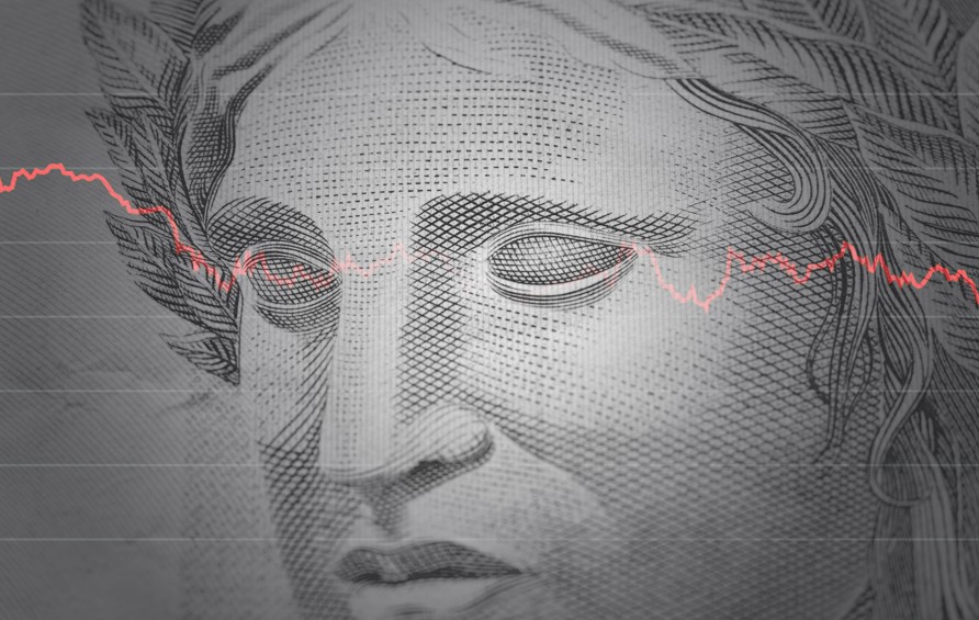 Tesouro faz emissão de títulos no exterior: imagem de nota de real e linha de gráfico