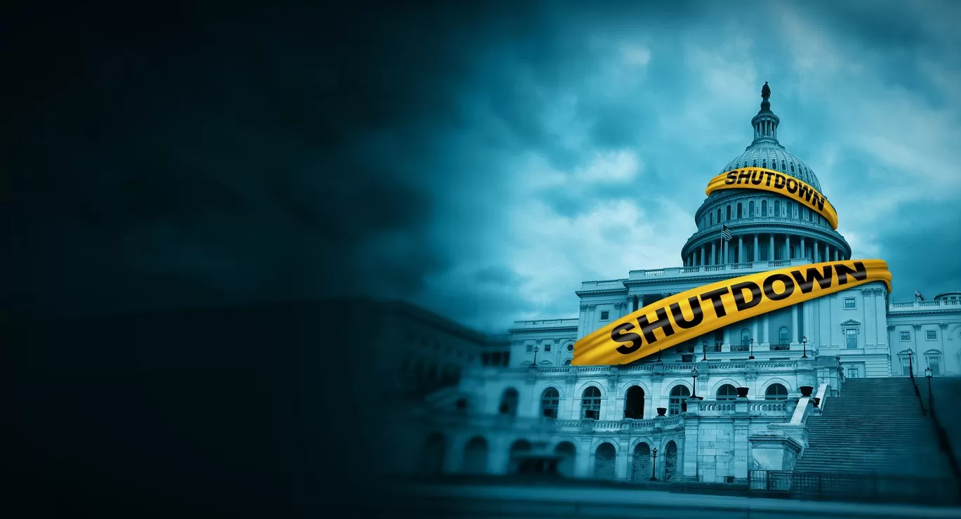 shutdown é o segundo maior da história: imagem de IA do Congresso Americano com faixa onde se lê shutdown